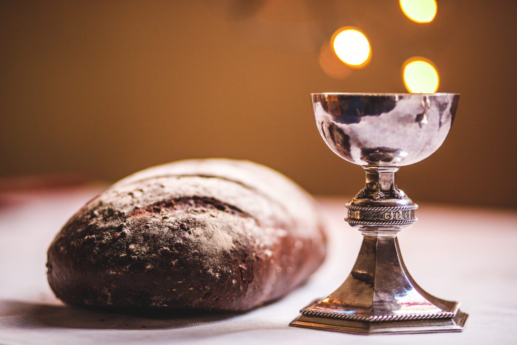 Photo of communion or the bread and the wine by James Coleman on Unsplash.com